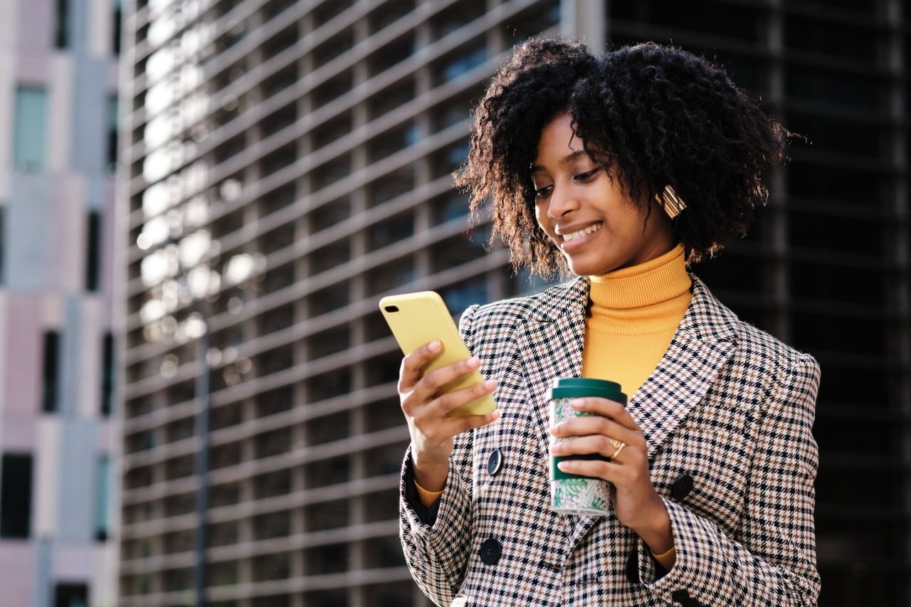 Business woman using her mobile phone.